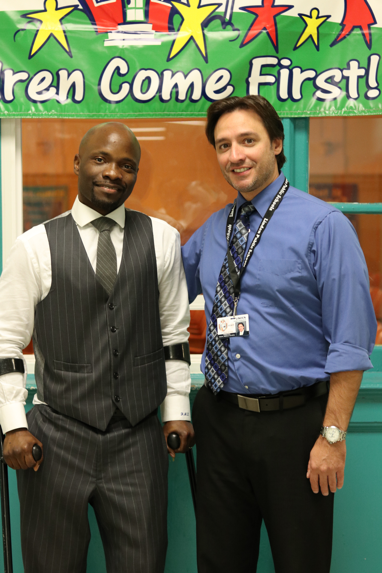 Hashim with a colleague at a Children Come First event