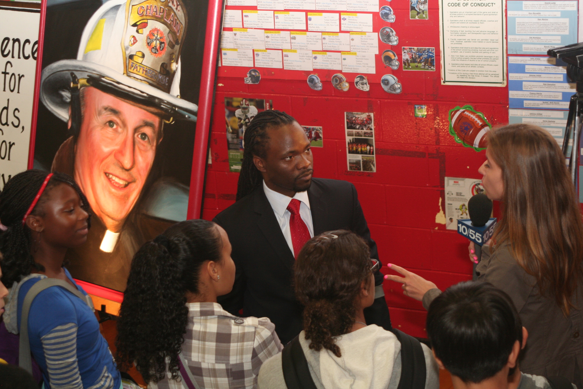 Hashim being interviewed about his school work