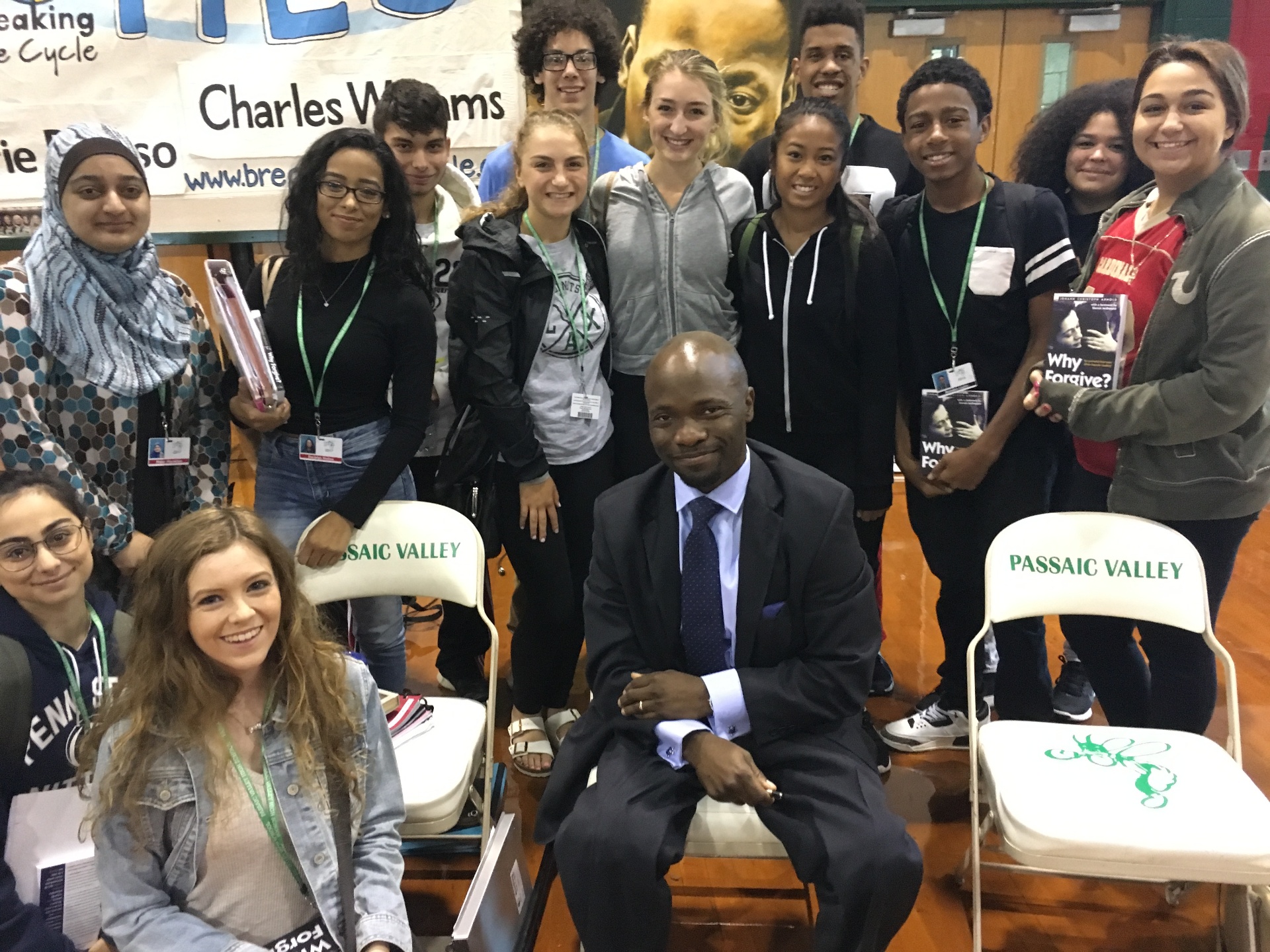 Hashim with students at Passaic Valley High School after a Breaking the Cycle event